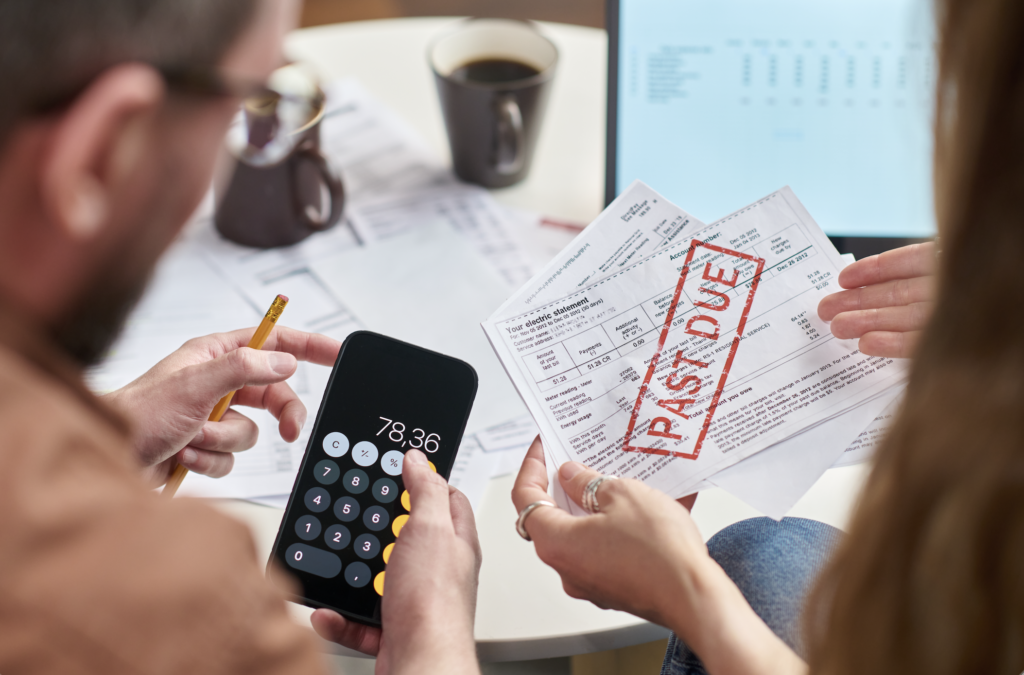 Taxpayer organizing several years of un-filed tax returns and IRS notices with help from a tax professional.
