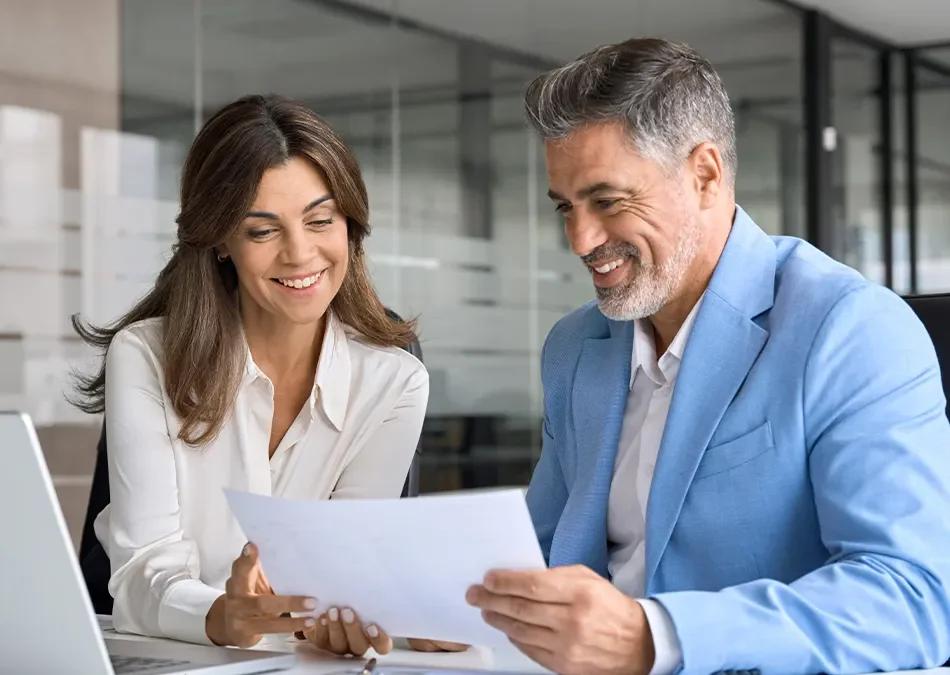 A tax planning woman reviewing taxes with a business client