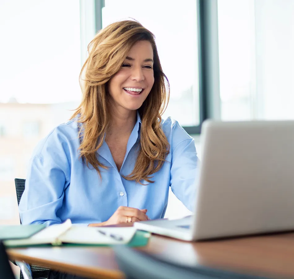 A smiling tax consultant in an online meeting